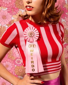 Woman in Striped Top with 'Weirdo' Ribbon
