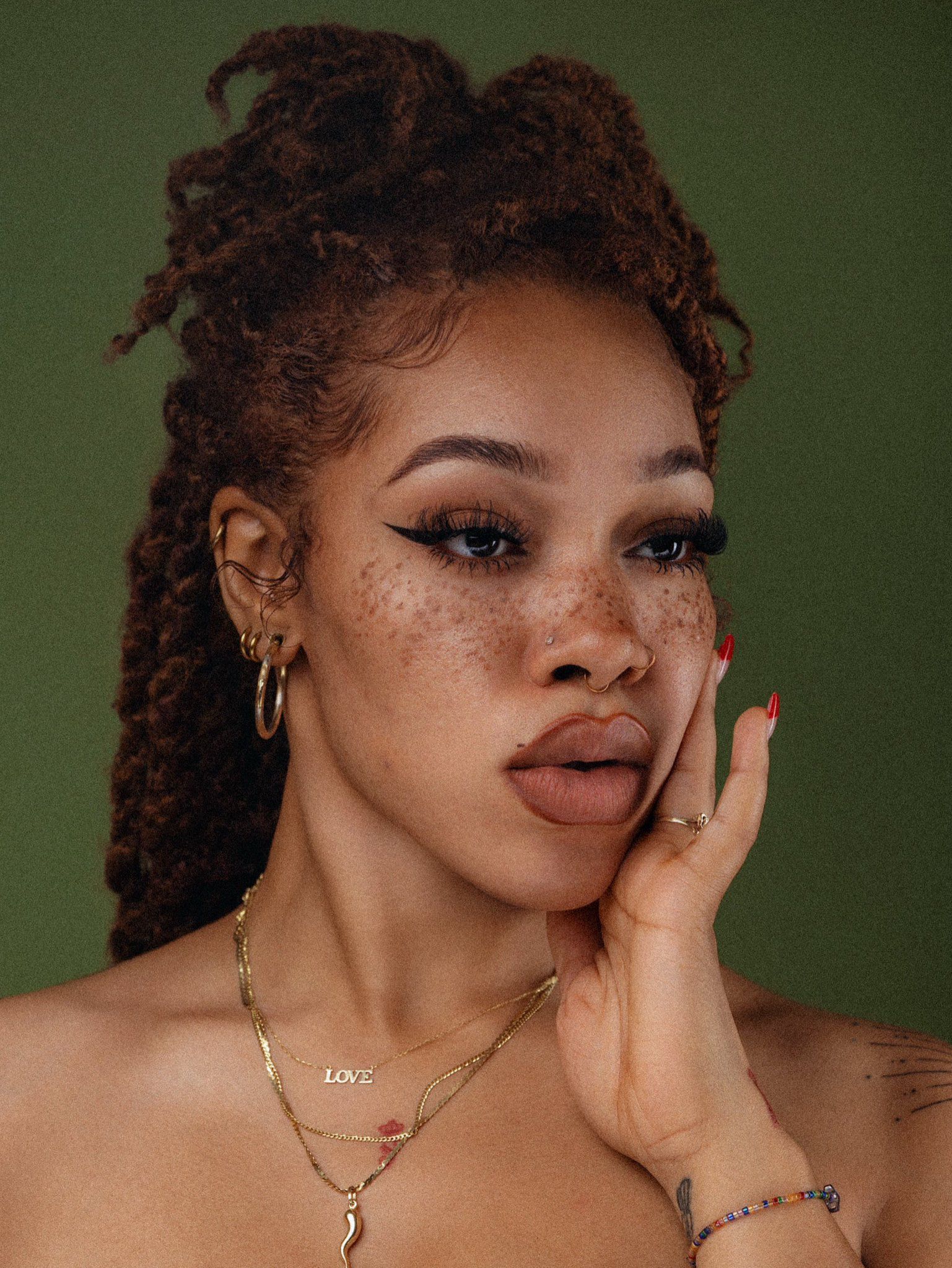 Curly Haired Woman with Freckles