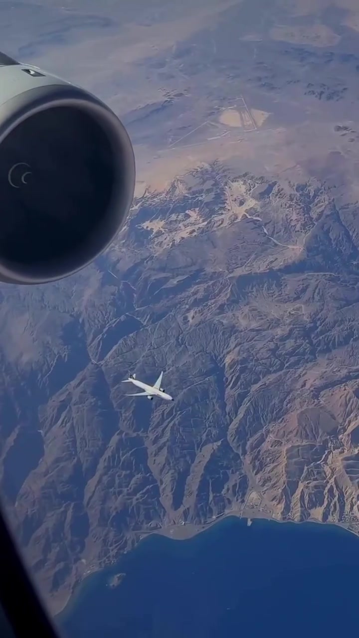 Airplane Flight Over Mountainous Terrain