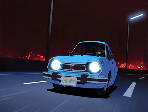 Blue Car on Road at Night
