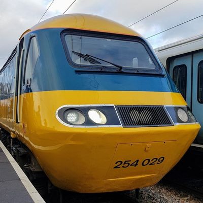Bright Yellow Train on Platform