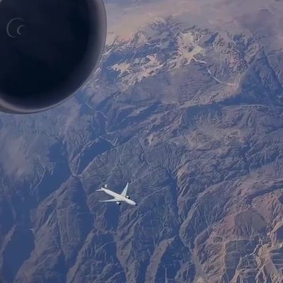 Airplane Flight Over Mountainous Terrain