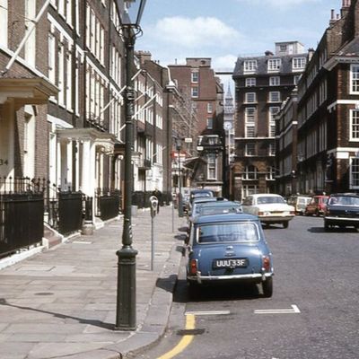 Vintage cars in a historic street