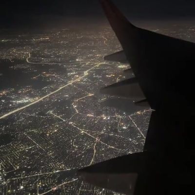 Night Flight Over City