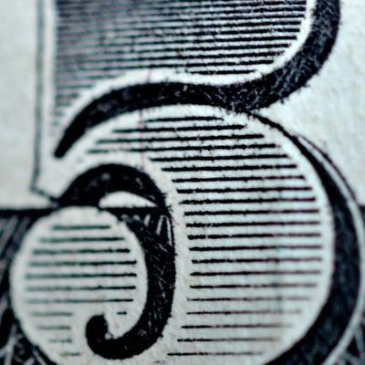 Close-Up of Number Six on Currency
