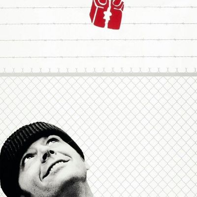 Man Looking Up at Red Robot