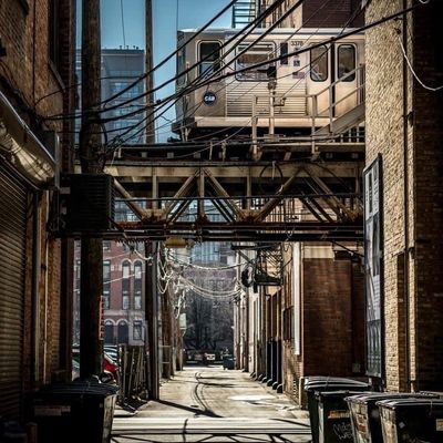 Urban Alleyway with Elevated Train