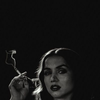 Woman Smoking in Dark