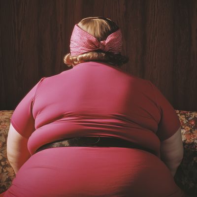 Back of a person in a pink outfit