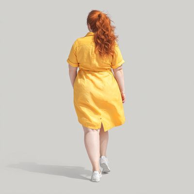 Back view of a person wearing a yellow dress