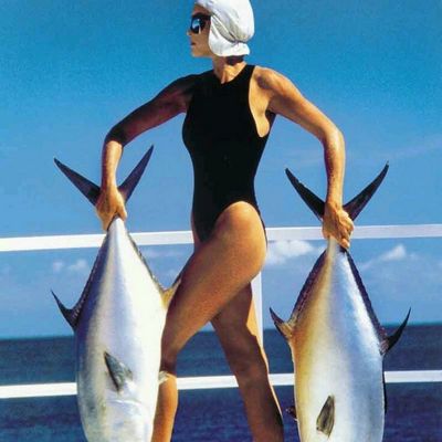 Woman in Swimsuit with Fish