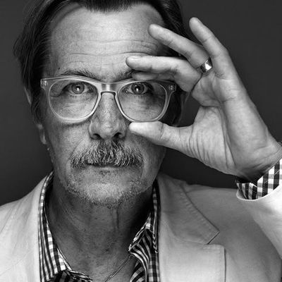 Man Adjusting Glasses