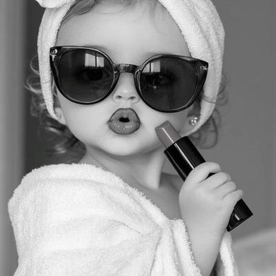 Child with Sunglasses and Lipstick
