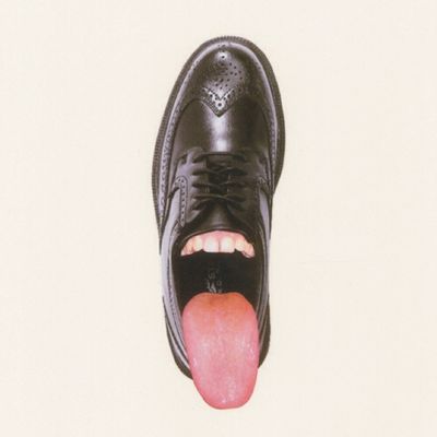Tongue sticking out of a shoe