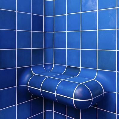Blue tiled corner with curved bench