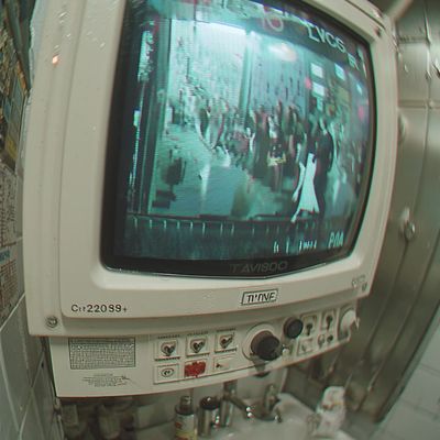 Monitor displaying crowded scene