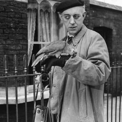 Man Holding Bird