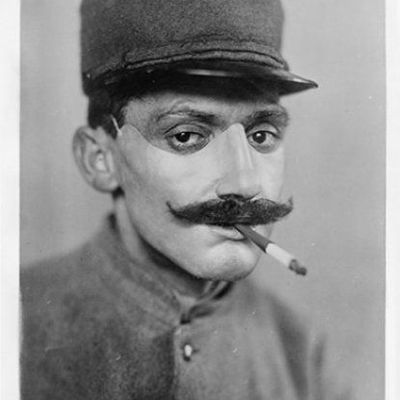 Man in Uniform Smoking