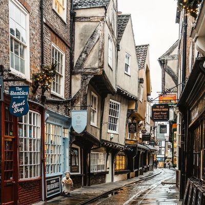 Narrow medieval street with shops