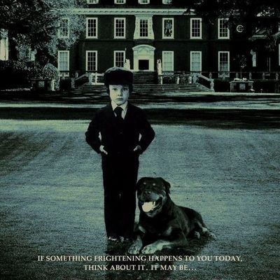 Child in Formalwear with Dog