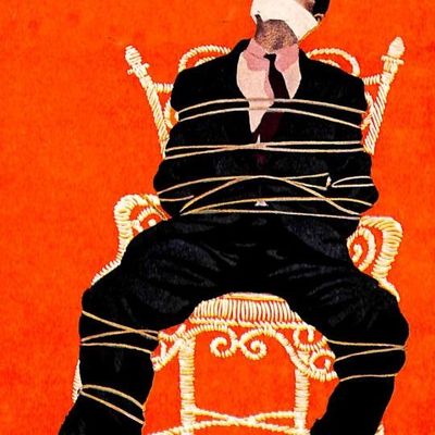 Man Tied Up in Chair