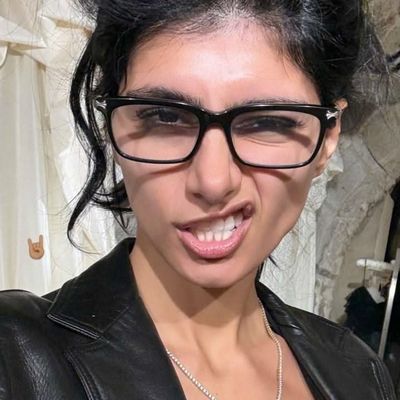 Woman in Glasses Smiling