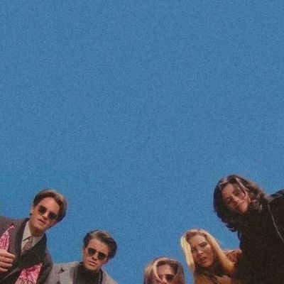 Group of people against blue sky