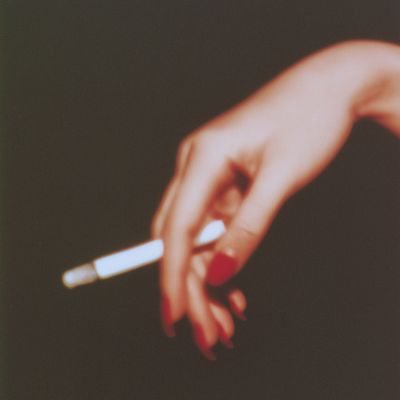 Hand holding cigarette