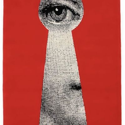 Eye Peeking Through Keyhole