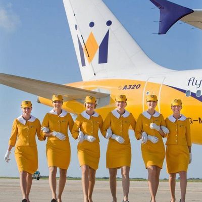 Airline Cabin Crew in Yellow Uniforms