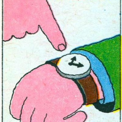 Close-up of hand pointing at watch