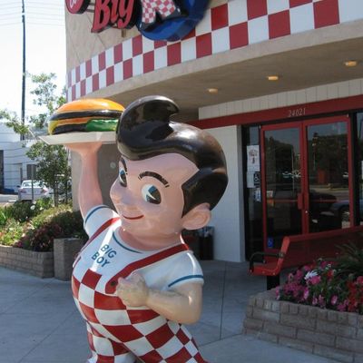 Big Boy Statue Holding Burger
