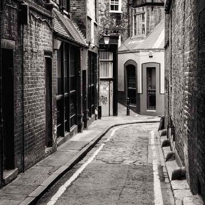 Narrow Cobblestone Alley