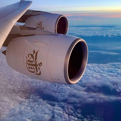 Airplane Engine Above Clouds