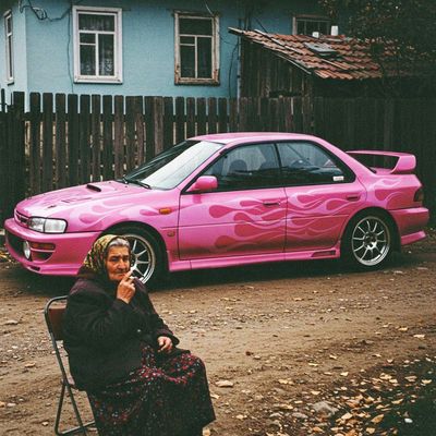 Pink Camouflage Car and Woman