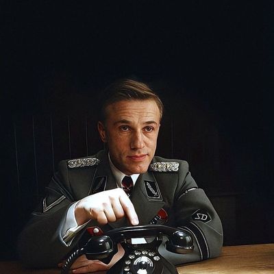 Man in Military Uniform Holding Phone