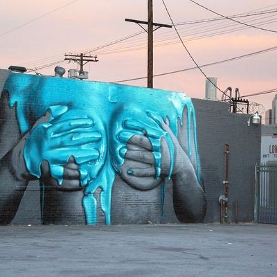Giant Blue Hands Graffiti