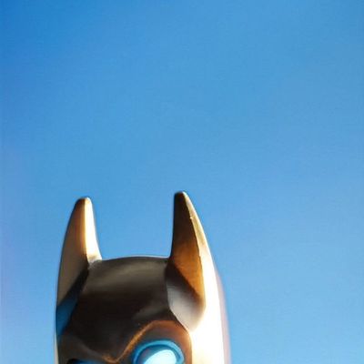 Giant Robot Head Against Blue Sky