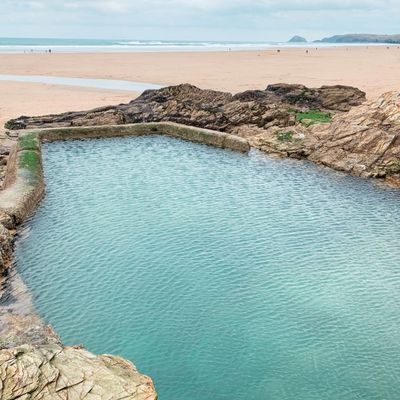 Natural Rock Pool on Sandy Beach