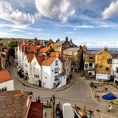 Coastal Village with Red Roofs