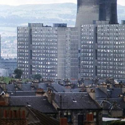 High-rise flats against industrial backdrop