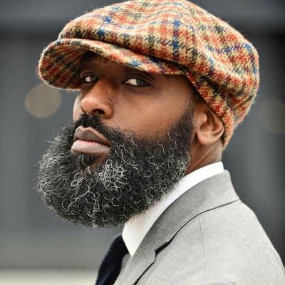 Man with Beard in Plaid Cap