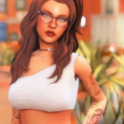 Woman with Glasses and Tattoos
