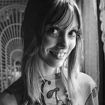 Smiling Woman with Long Hair