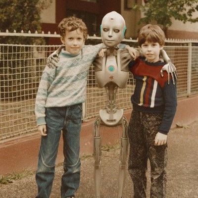 Vintage Robot with Two Boys
