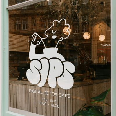 Sips Digital Detox Cafe cafe window cartoon coffee interior