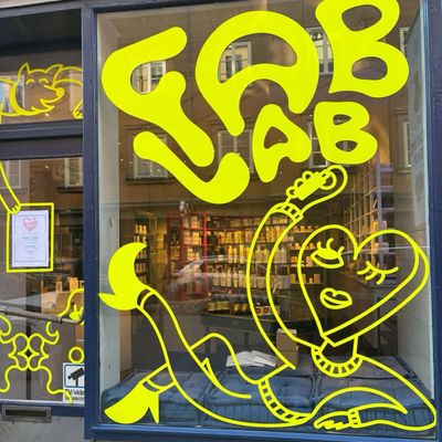 Yellow Neon Snake in Shop Window