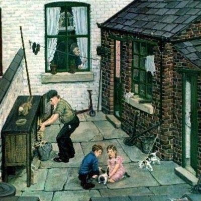 Family Scene Outside Brick Cottage
