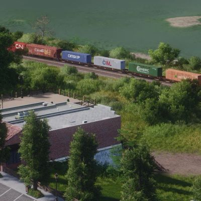 Freight Train Through Green Landscape