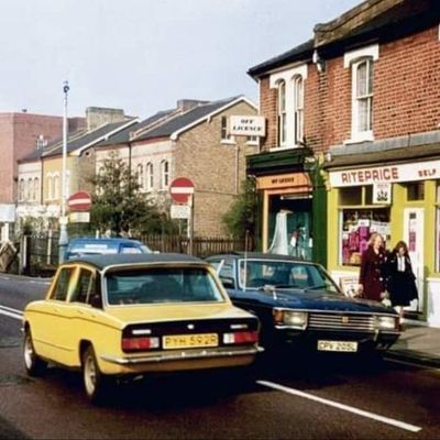 Vintage Street Scene vintage street scene brick houses vintage cars suburban